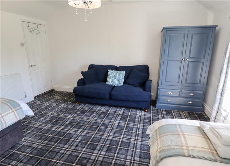 Relax in the living area at Holly Cottage, Wickenby near Wragby