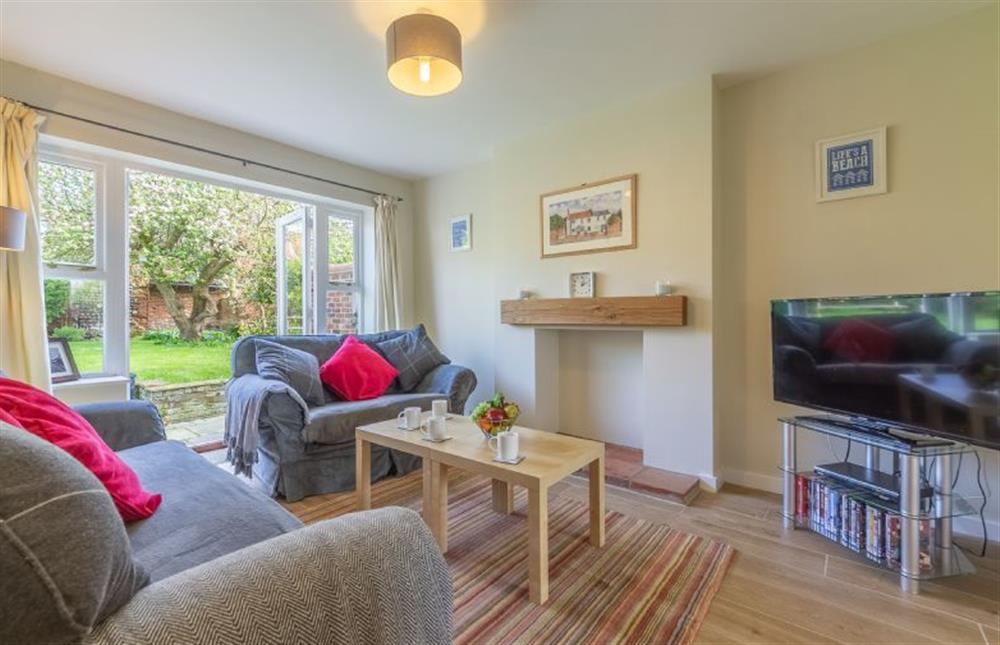 Holly House: Cosy sitting room with comfy seating and smart television  at Holly House, Wells-next-the-Sea