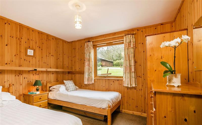 This is a bedroom (photo 2) at Holly Lodge 4 Bedrooms, Minehead