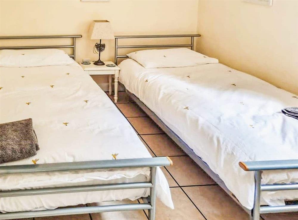 Twin bedroom at Holly Lodge in Bramerton, Norfolk
