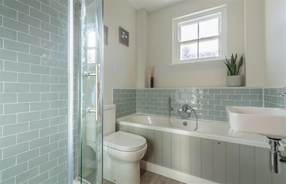 First floor: Family bathroom has bath and separate shower at Holly Lodge, Wells-next-the-Sea