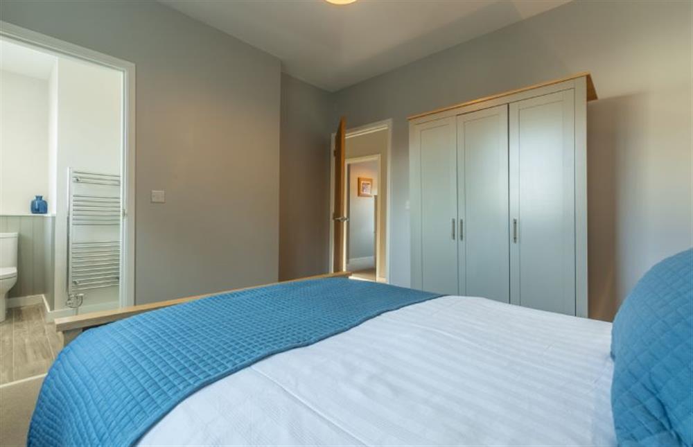 First floor: The master bedroom has en-suite shower room at Holly Lodge, Wells-next-the-Sea
