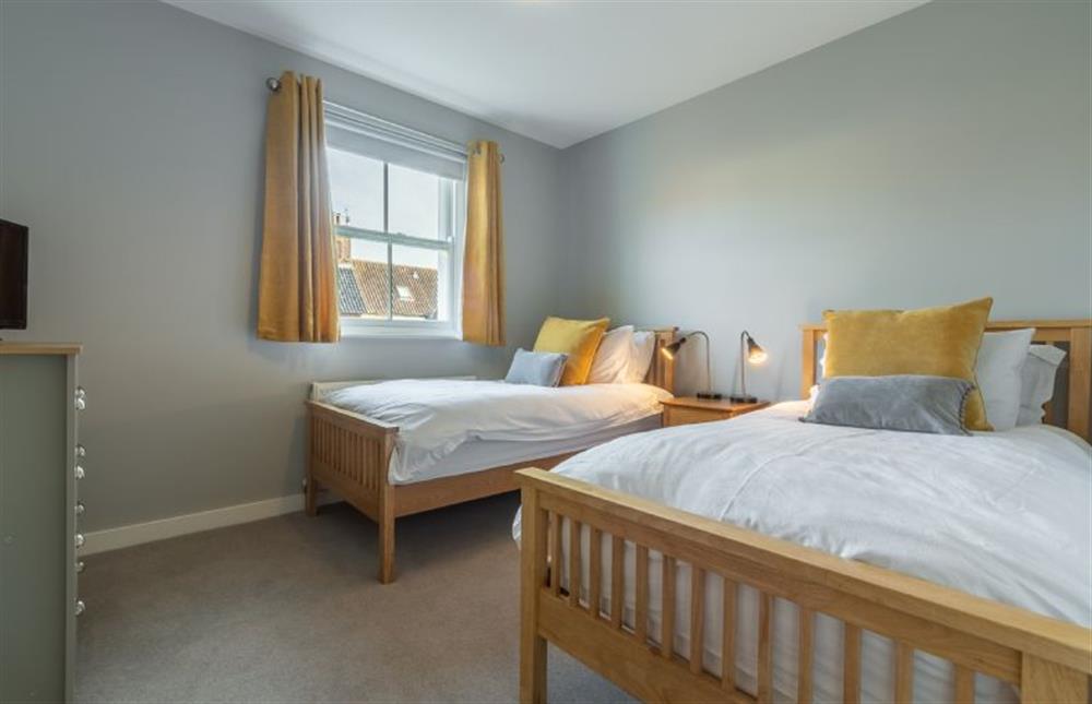 First floor: The twin bedroom overlooks the garden at Holly Lodge, Wells-next-the-Sea