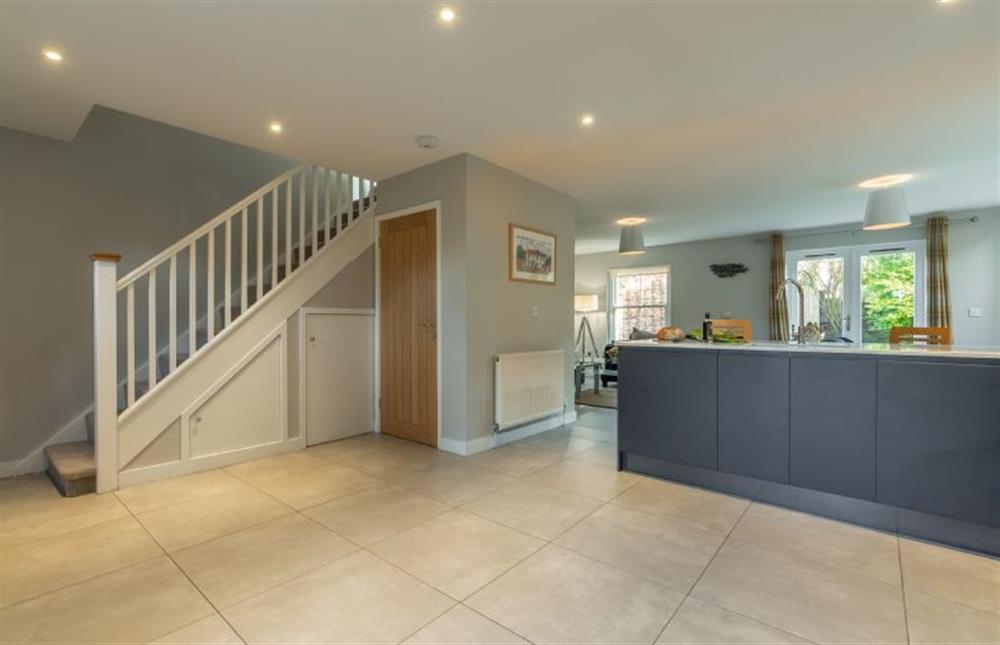 Ground floor: Cloakroom and stairs to first floor at Holly Lodge, Wells-next-the-Sea