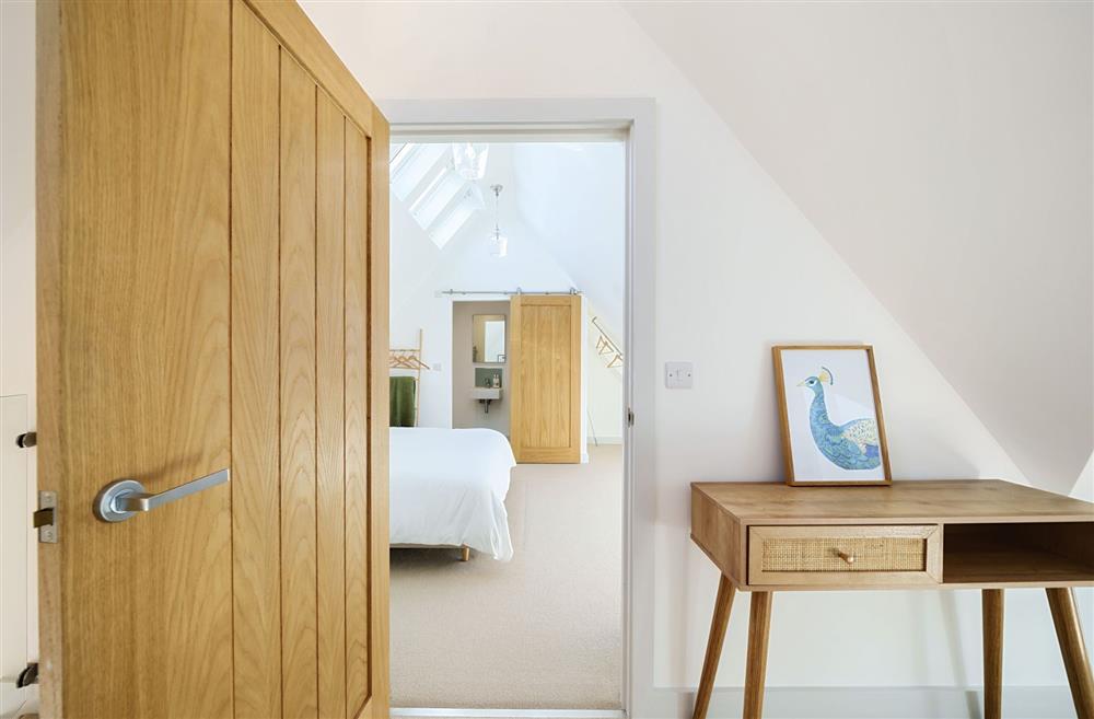 The first floor bedroom viewed from the mezzanine at Hollybank Barn, Dorchester