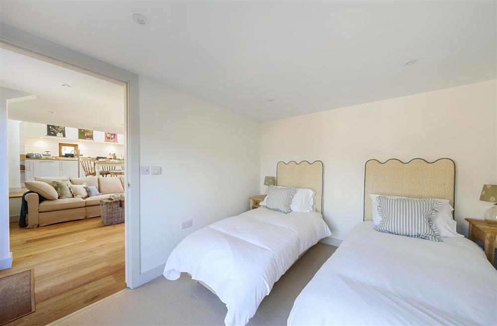 The ground floor twin bedroom with 2’6 single beds. at Hollybank Barn, Dorchester