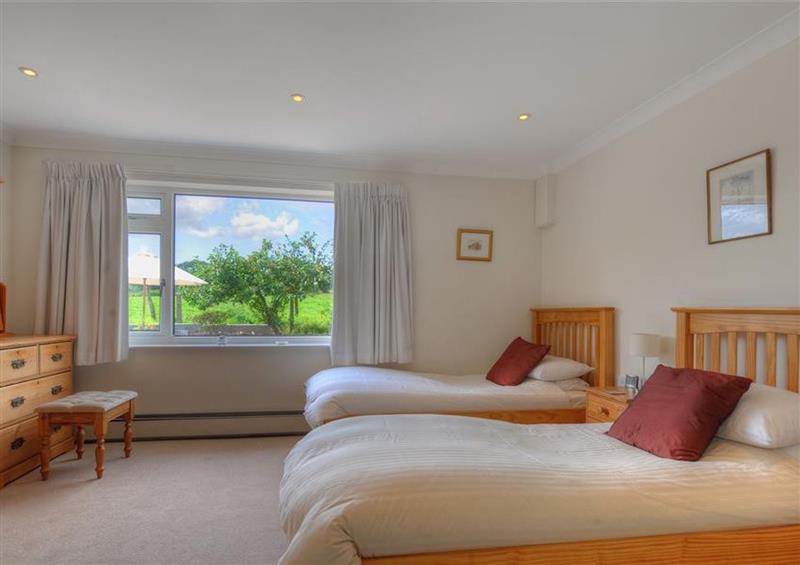 One of the 2 bedrooms at Hollycombe Cottage, Charmouth