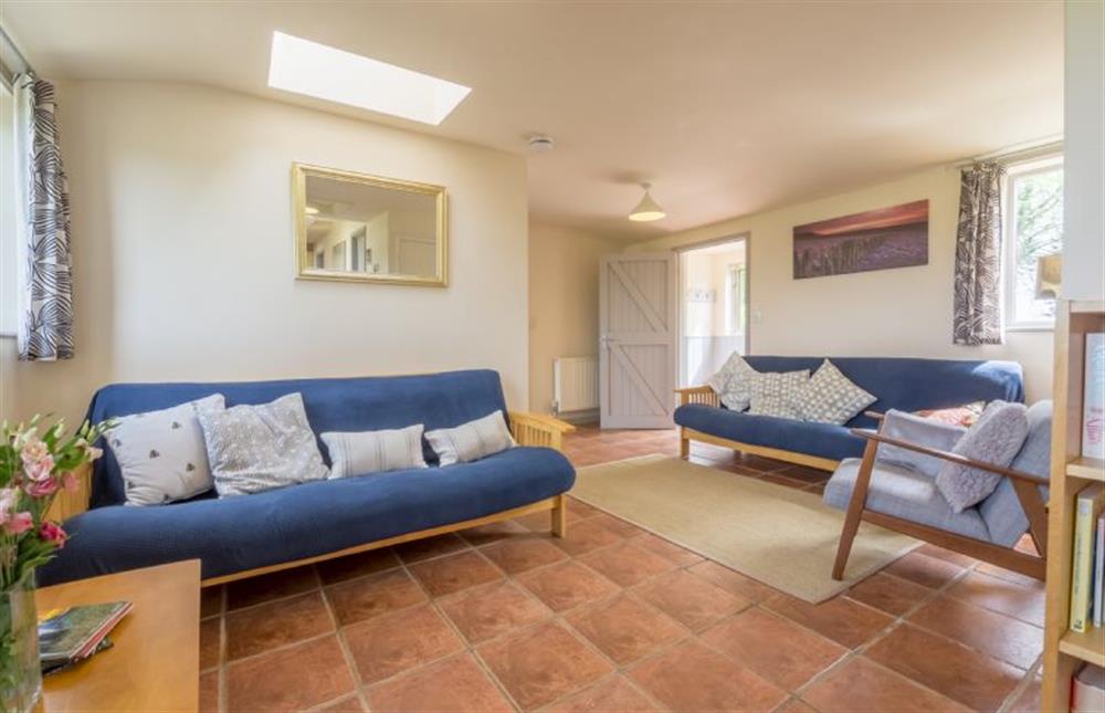 Ground floor: Duel aspect sitting room at Hollyhock, Houghton near Kings Lynn
