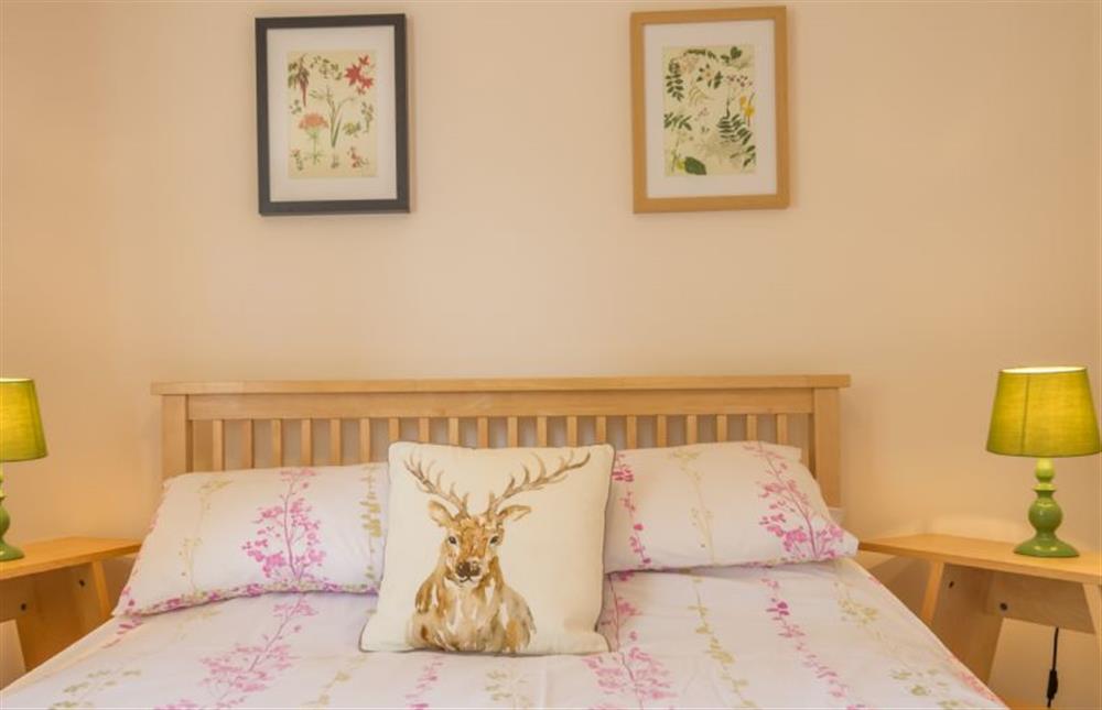 Ground floor: Master bedroom with double bed (photo 3) at Hollyhock, Houghton near Kings Lynn