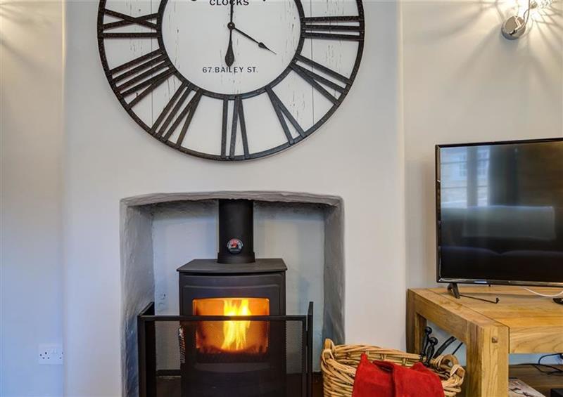 Relax in the living area at Hollytree Cottage, Hook Norton