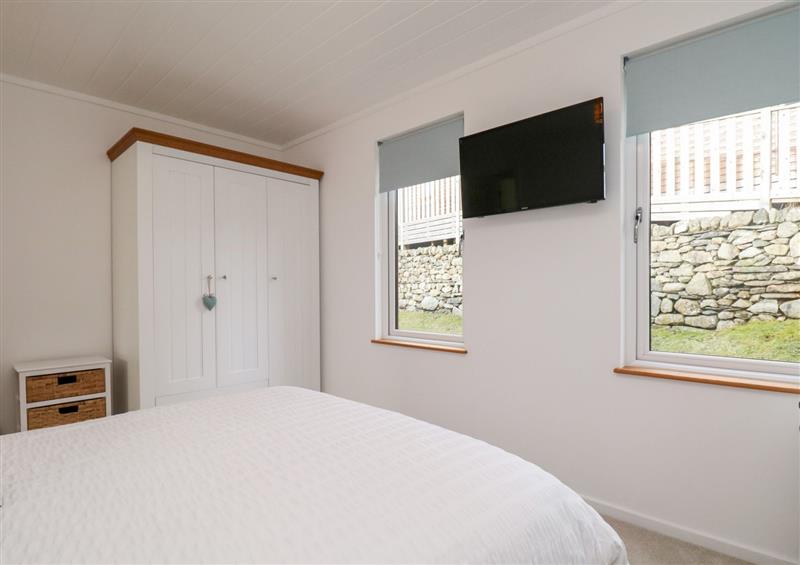 This is a bedroom (photo 3) at Hollytree Lodge, Beckside 1