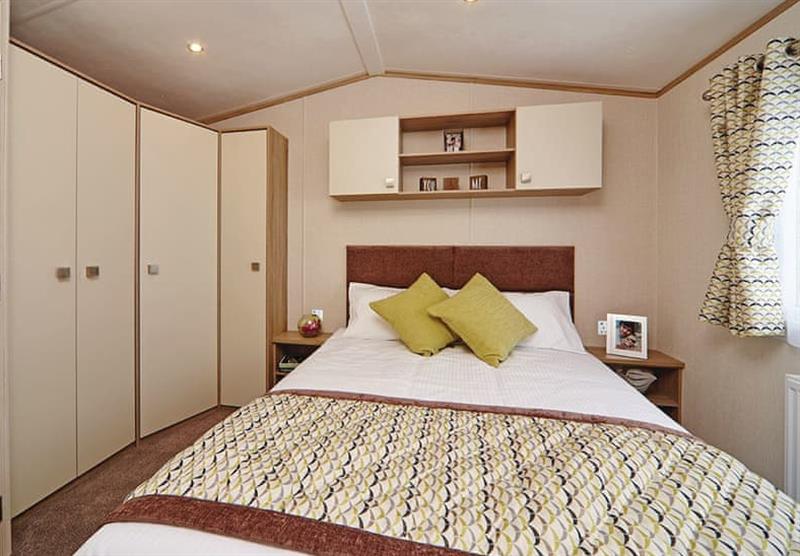 Double bedroom in a Platinum Caravan Six Plus VIP at Holmans Wood in Chudleigh, South Devon