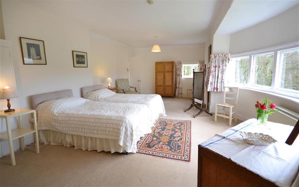 The master room benefits from huge windows with Exmoor views. at Holmbush in Withypool