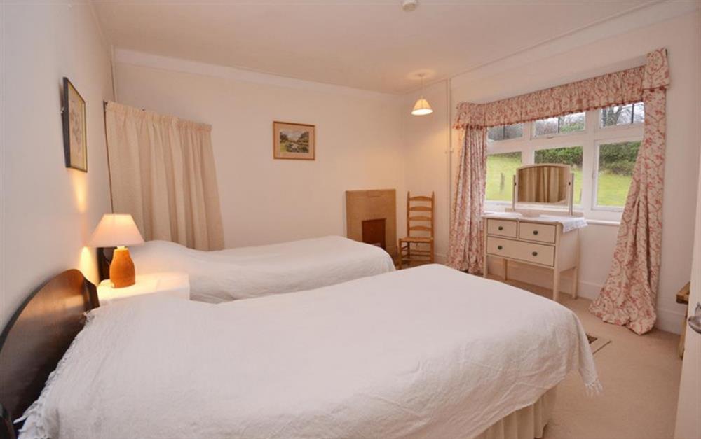 The third twin bedroom with garden views. at Holmbush in Withypool
