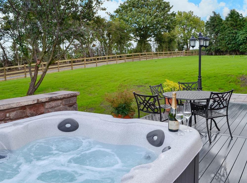 Relaxing private hot tub at Holmegarth in Arkleby, near Aspatria, Cumbria
