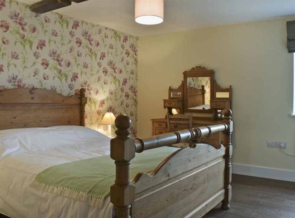 Comfortable double bedroom at Waxwing Cottage, 