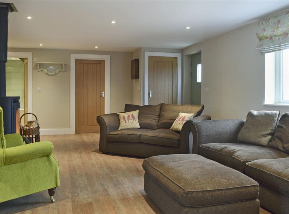Superbly renovated open plan living space at Waxwing Cottage, 