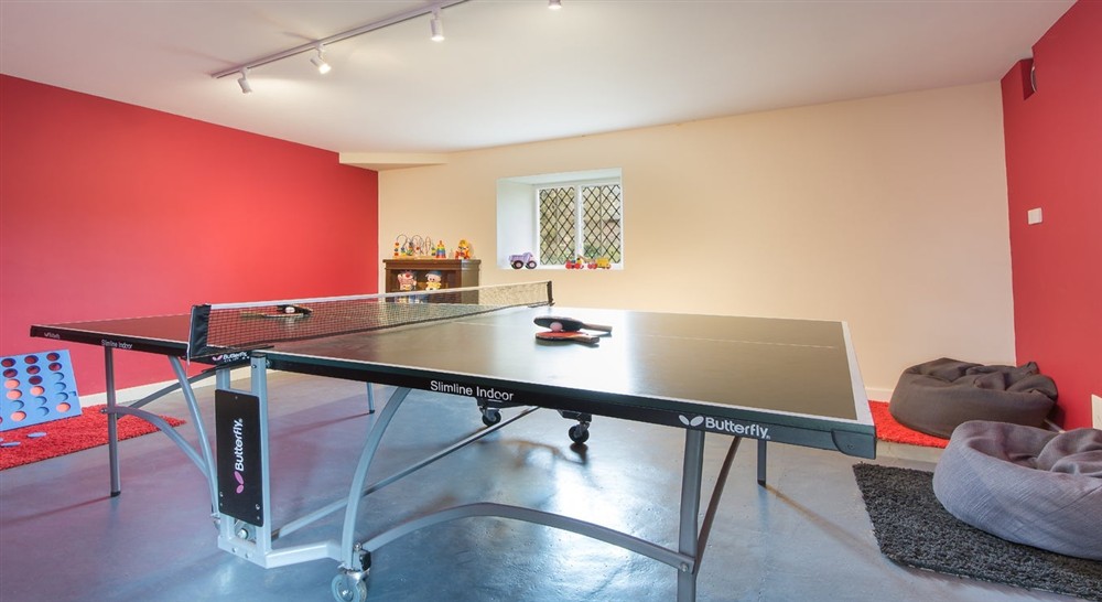 The in-house games room at Holnicote Lower House in Minehead, Somerset