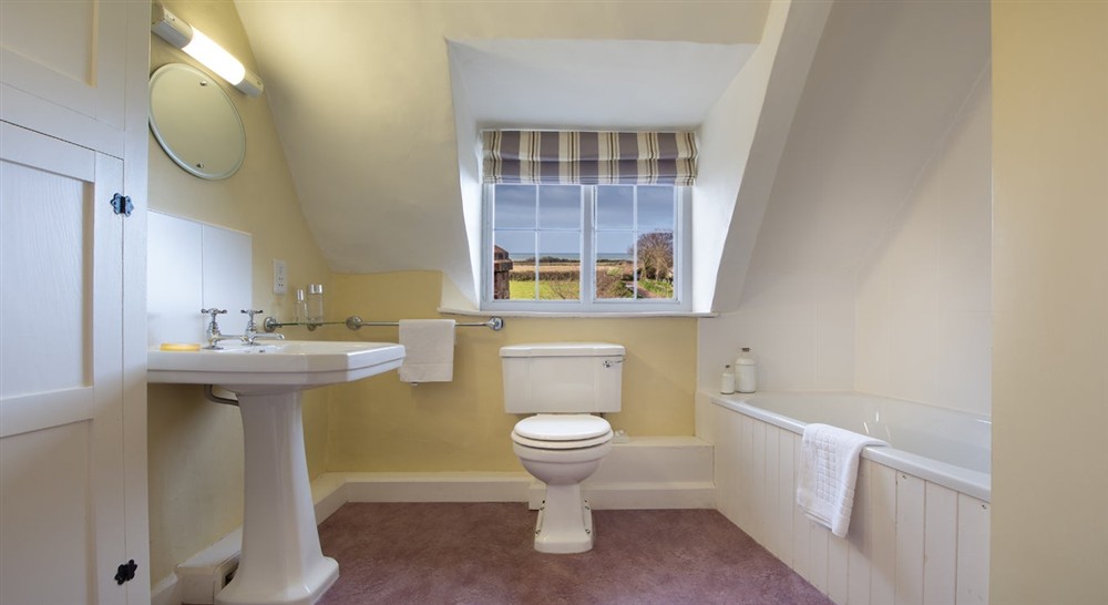 The upstairs bathroom at Holnicote Lower House in Minehead, Somerset