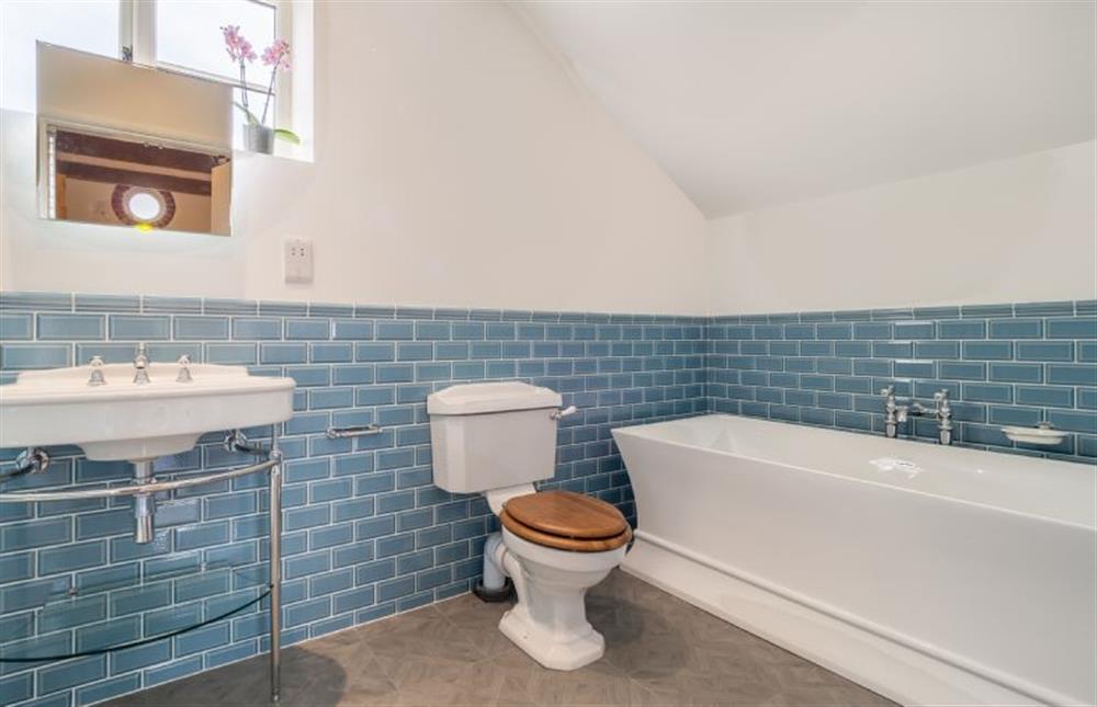 The elegant free-standing bath in the en-suite bathroom at Holt Coach House, Sudbury