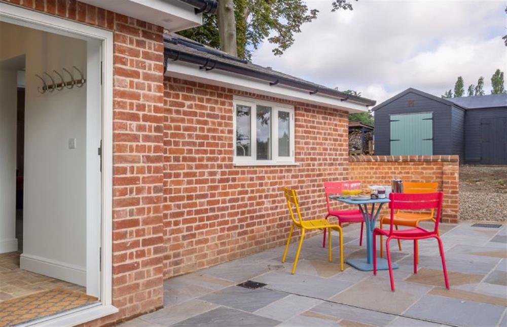 The spacious outdoor terrace, perfect for al fresco dining at Holt Coach House, Sudbury