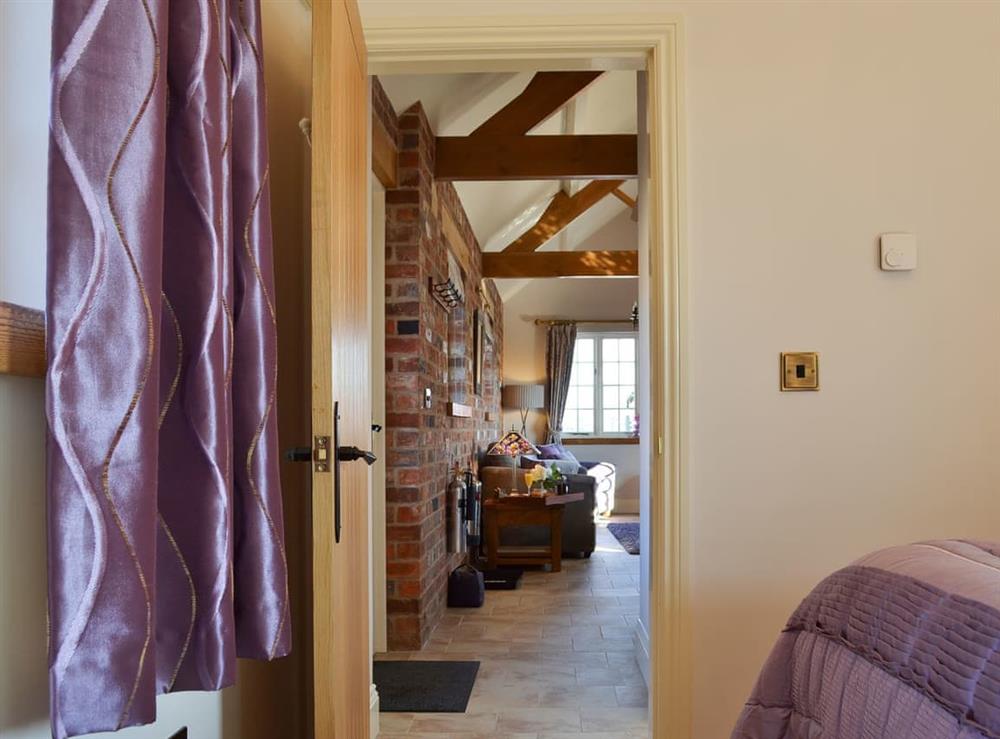 Charming bedroom directly access from the living areas at Cozy Cottage, 