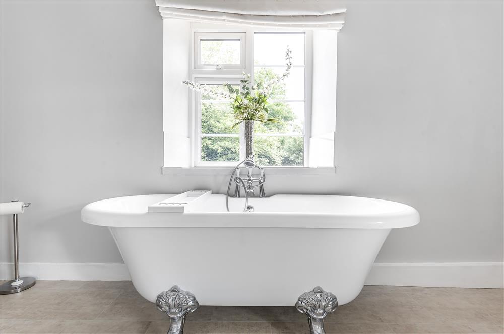 First floor: The roll-top bath in the en-suite bathroom at Holway Cottage, Cattistock