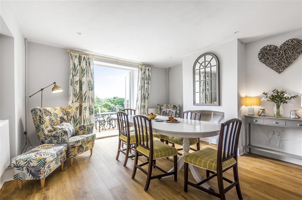 Ground floor: Dining area with french doors at Holway Cottage, Cattistock