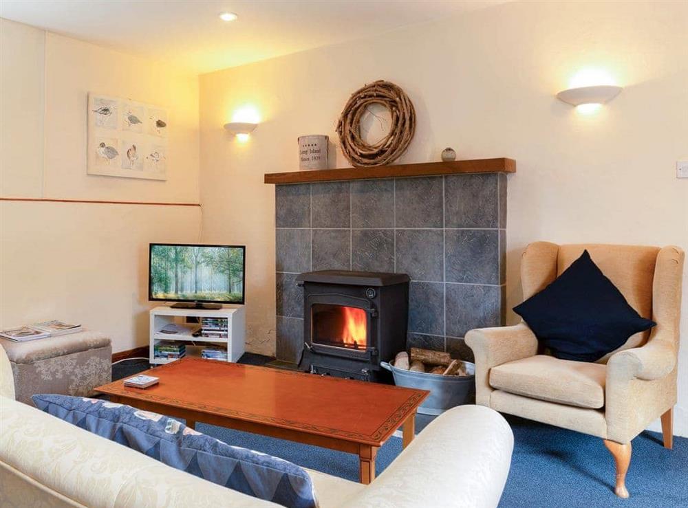Warm and cosy living room at The Stables, 