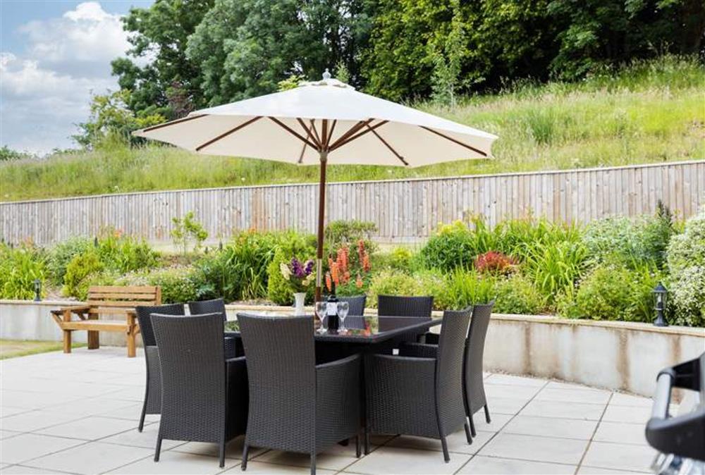 Relax on the patio in the tranquility of Holywell House, Somerset