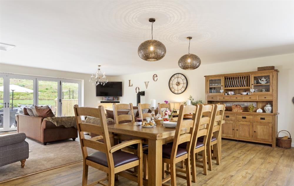 Spacious open-plan kitchen, dining and sitting room at Holywell House, Wellington