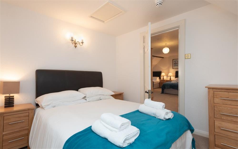 Double bedroom (accessed through the triple room) at Home Cottage in Thurlestone