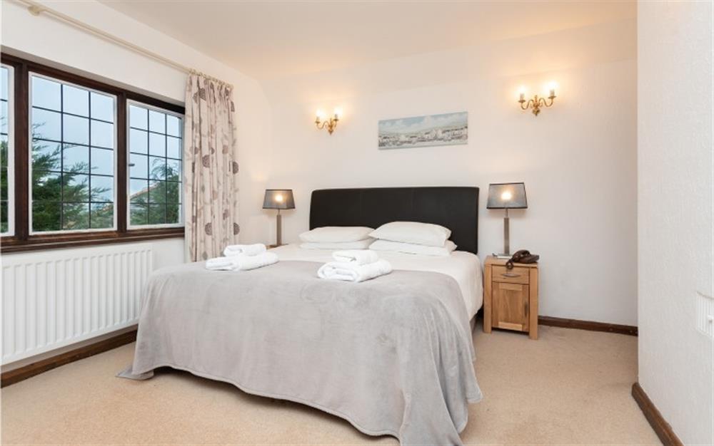 Master bedroom  at Home Cottage in Thurlestone