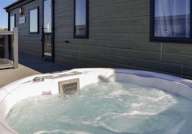 Hot tub in the Poppy Premier at Home Farm Park Lakeside Retreat in Burgh le Marsh, Lincolnshire