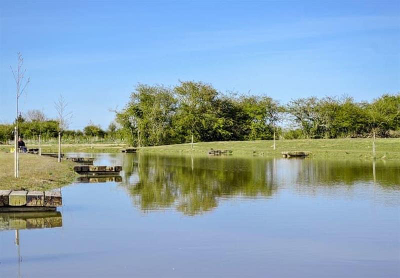 The lake at Home Farm Park Lakeside Retreat in Burgh le Marsh, Lincolnshire