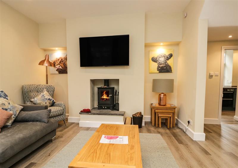 Relax in the living area (photo 2) at Home Farmhouse, Graythwaite near Hawkshead