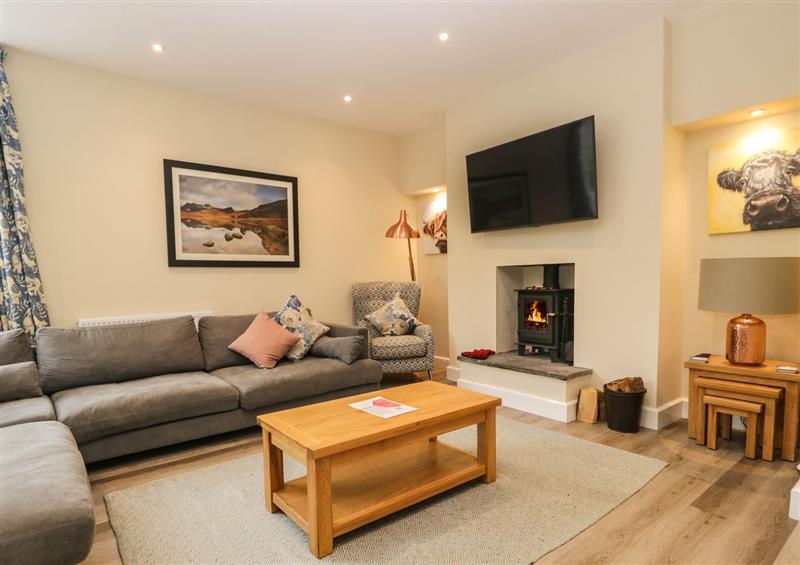 Relax in the living area at Home Farmhouse, Graythwaite near Hawkshead