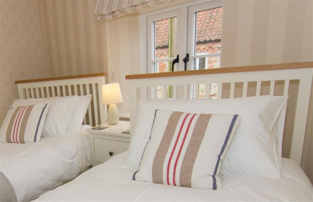First floor: Bedroom two, twin room at Home Lea, Docking near Kings Lynn