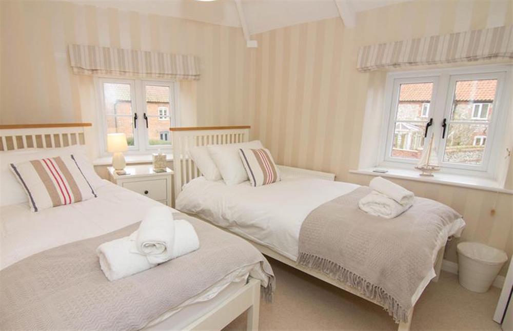 First floor: Bedroom two, twin with double aspect at Home Lea, Docking near Kings Lynn