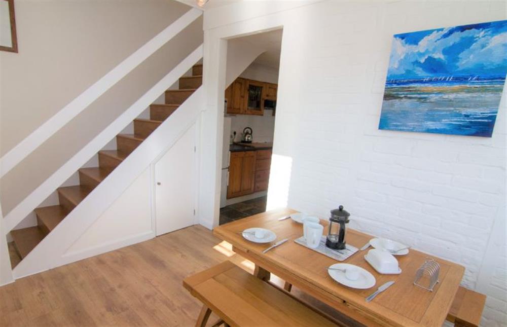 Ground floor: Dining hall with stairs to first floor at Home Lea, Docking near Kings Lynn