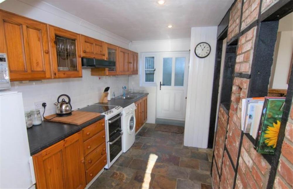 Ground floor: Kitchen with exposed beam wall at Home Lea, Docking near Kings Lynn