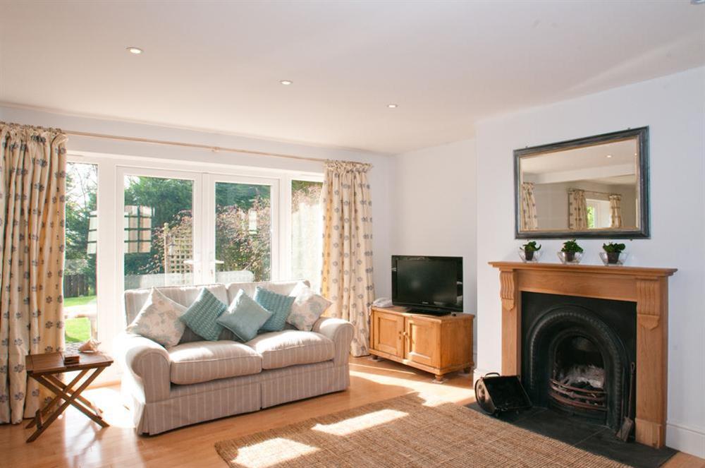 Spacious L-shaped lounge with French doors to terrace at Homefield House in Nr Kingsbridge, Devon