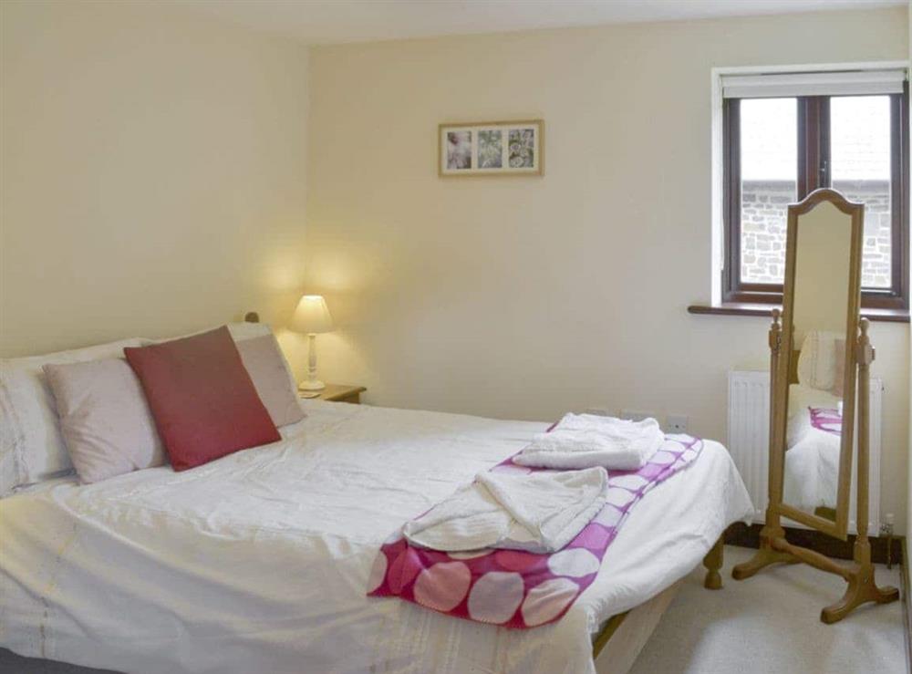 Comfortable double bedroom at Homeleigh Barn in Poundstock, Bude, Cornwall