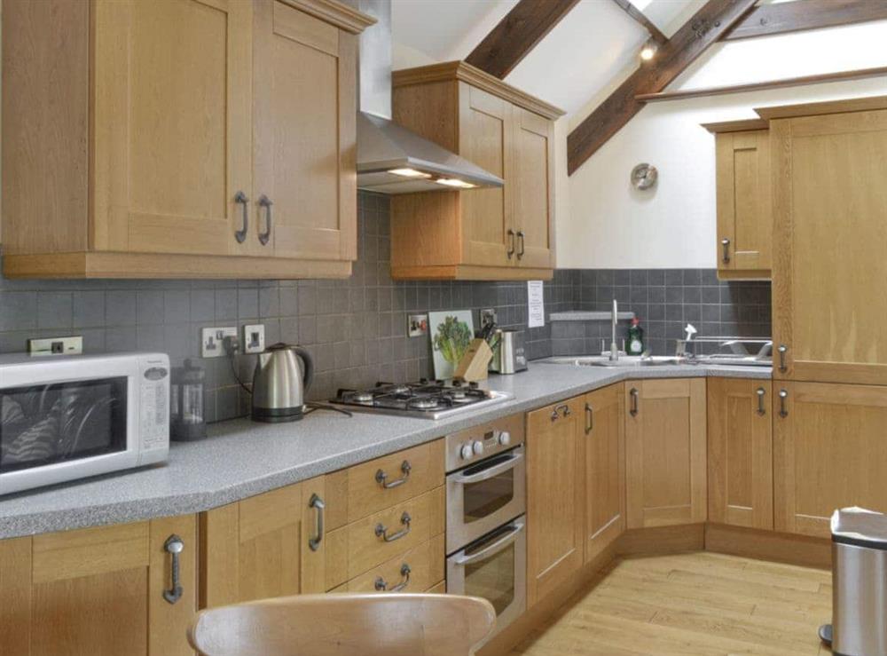 Fully-appointed kitchen at Homeleigh Barn in Poundstock, Bude, Cornwall