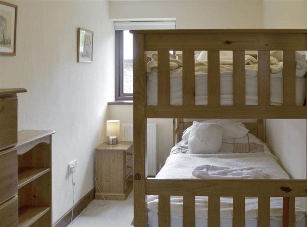 Good-sized bunk bedroom at Homeleigh Barn in Poundstock, Bude, Cornwall