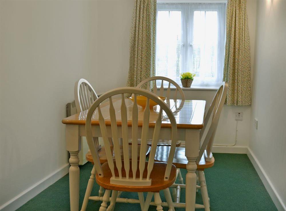 Quaint dining area at Homestead Cottage in Downton, Wiltshire