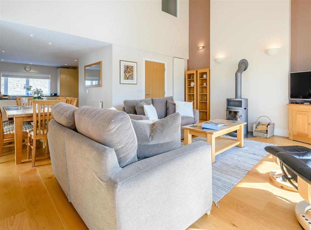 Open plan living space at Honey Cottage in Cirencester, Gloucestershire