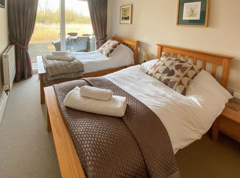 Twin bedroom at Honey Cottage in Cirencester, Gloucestershire