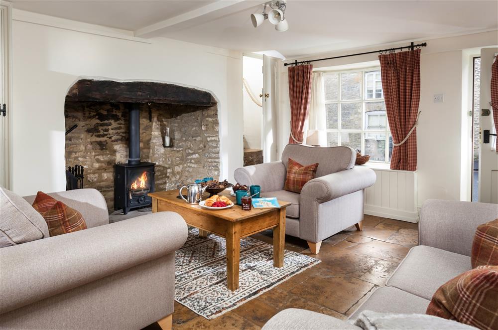 The cosy sitting room with wood burning stove