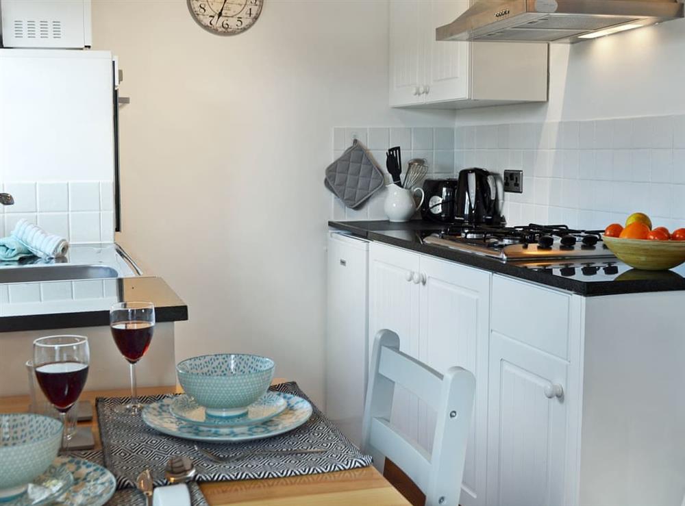 Modern kitchen area at Honey Meadow Cottage in Sharpthorne, near Haywards Heath, West Sussex